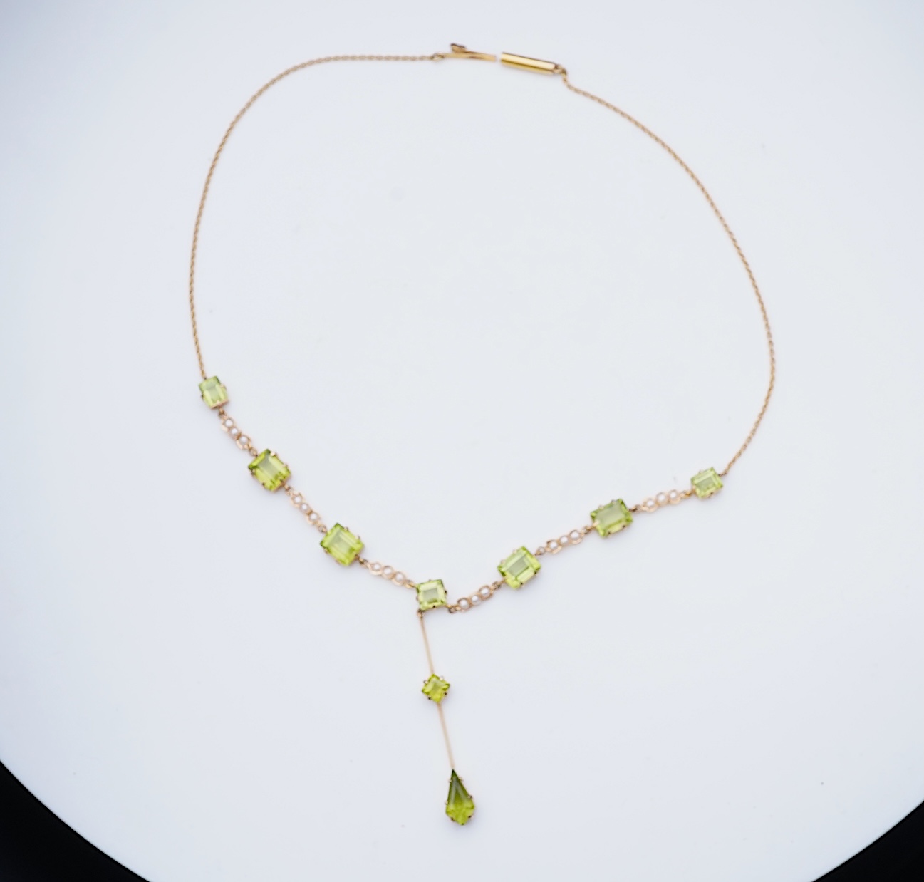 An Edwardian peridot and seed pearl necklace, early 20th century